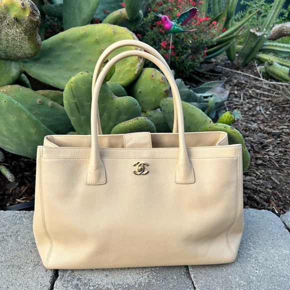 CHANEL Handbags - CHANEL Beige Caviar Leather Tote with Gold CC Logo